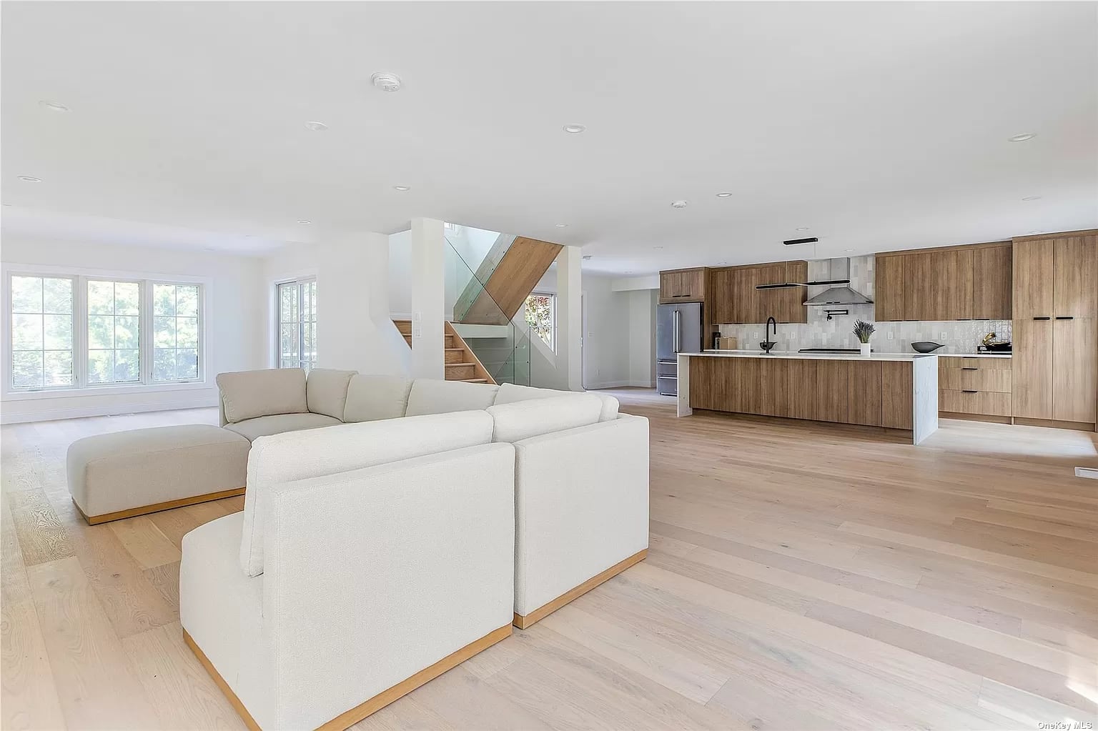 Open living room and kitchen at Oxford Residence