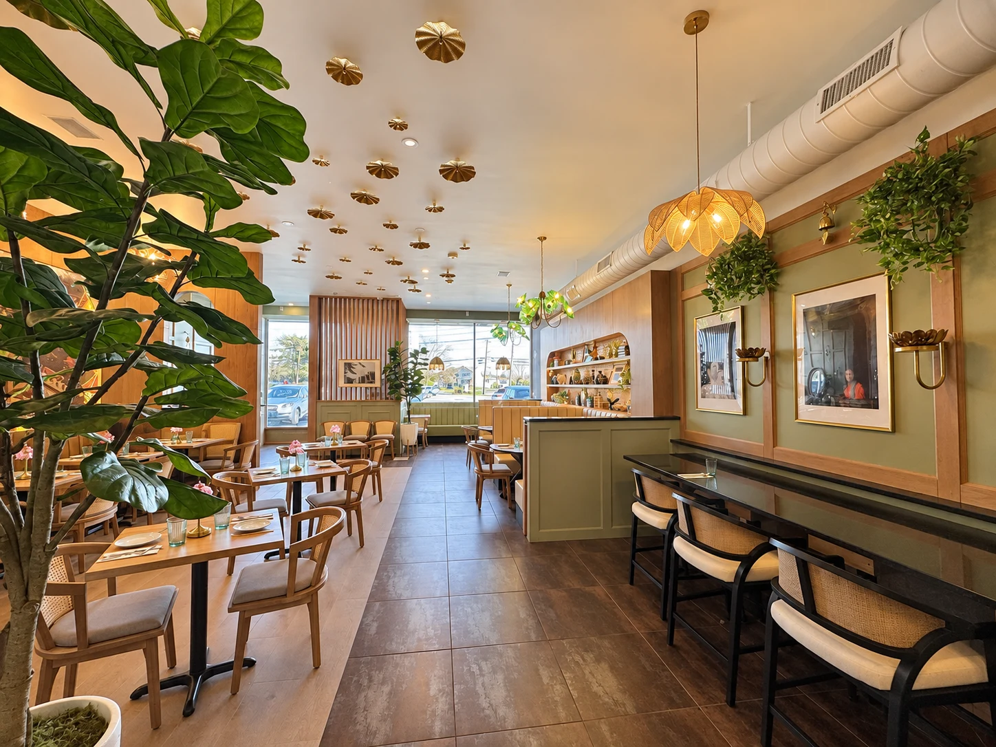 The central dining aisle, wall counter and daylight from the storefront