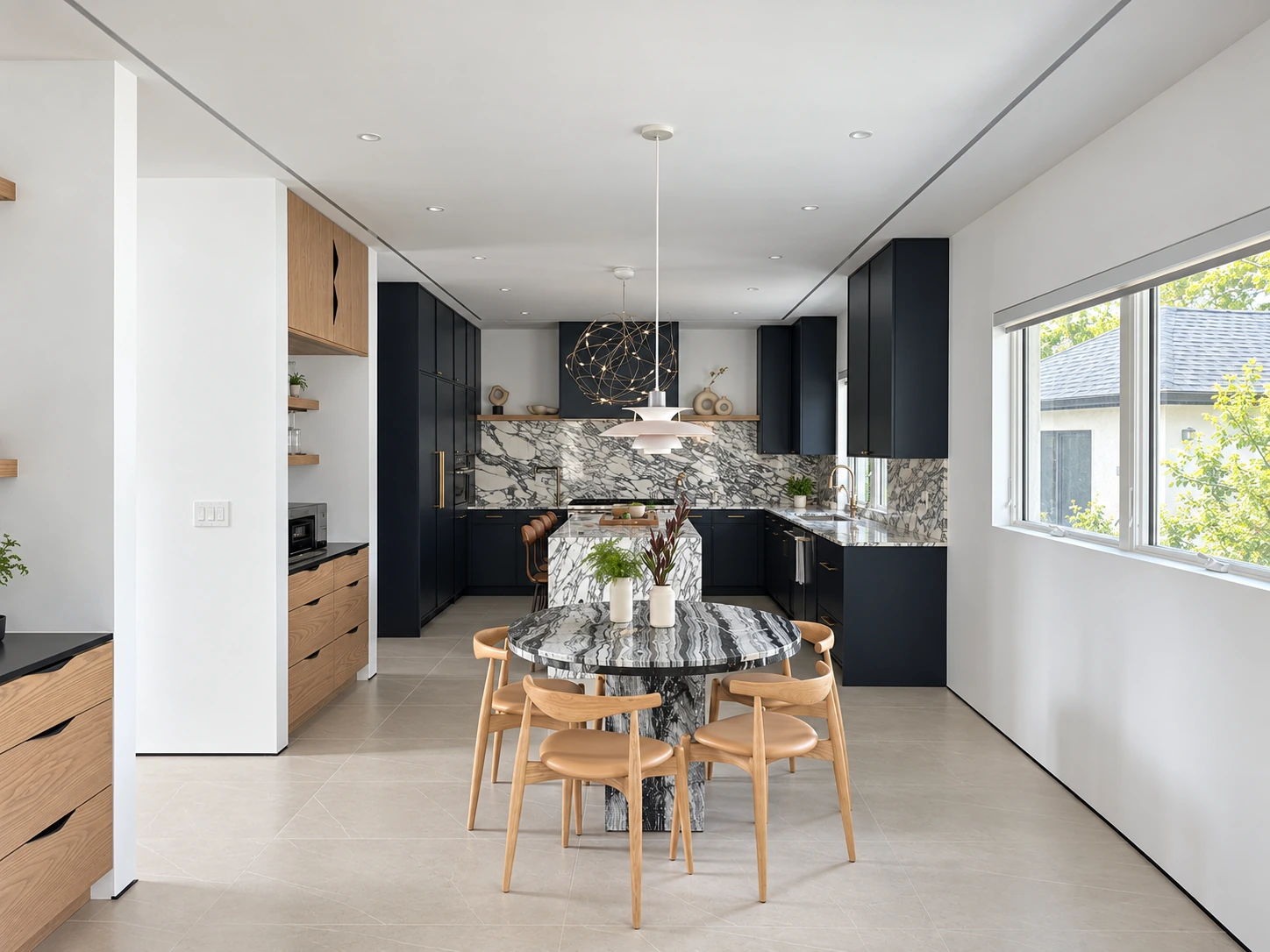 Open kitchen and dining area at Webb Hill Residence
