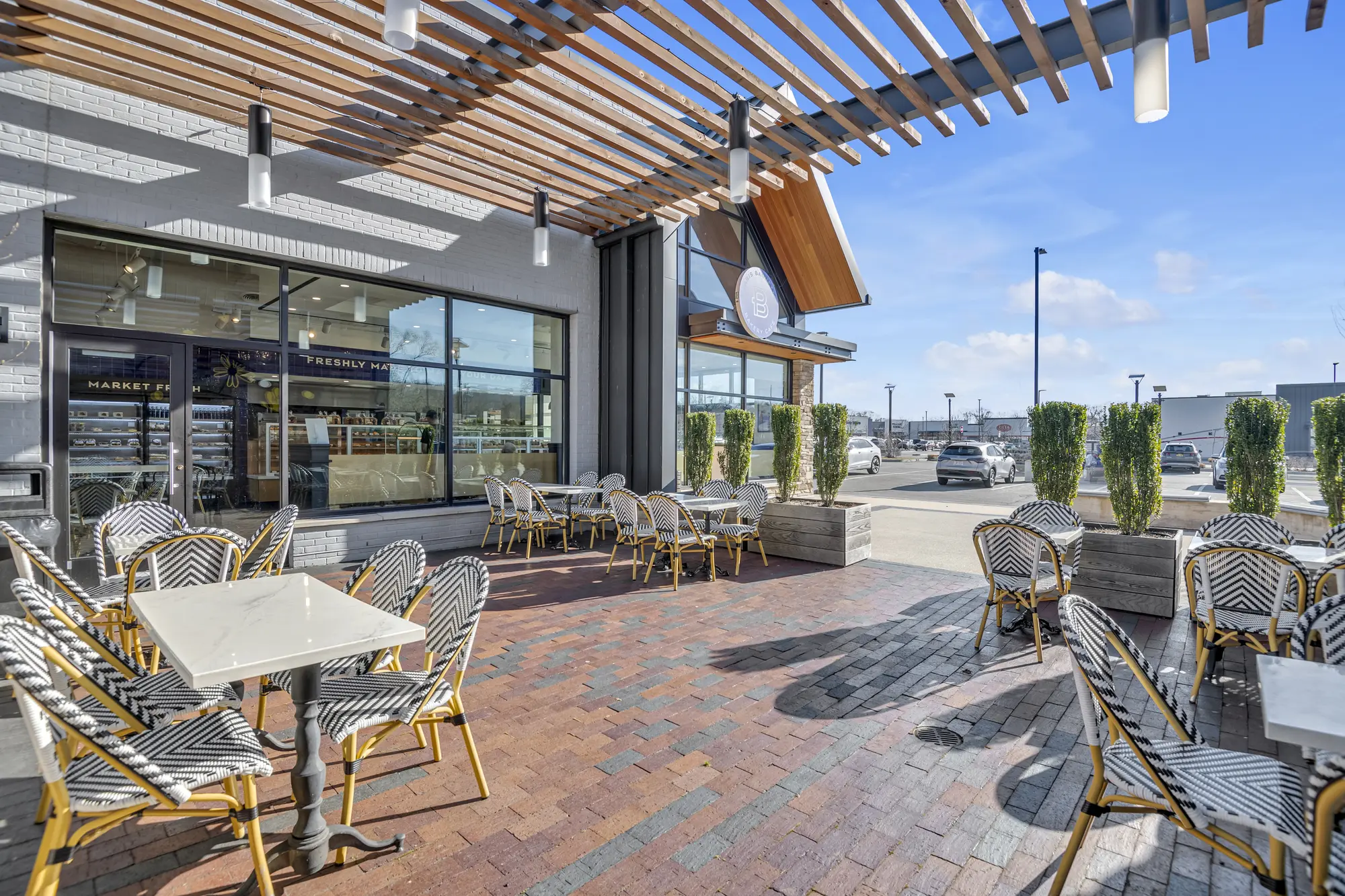 Outdoor terrace beneath a timber pergola